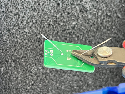 Snip the excess with the flush cutters.